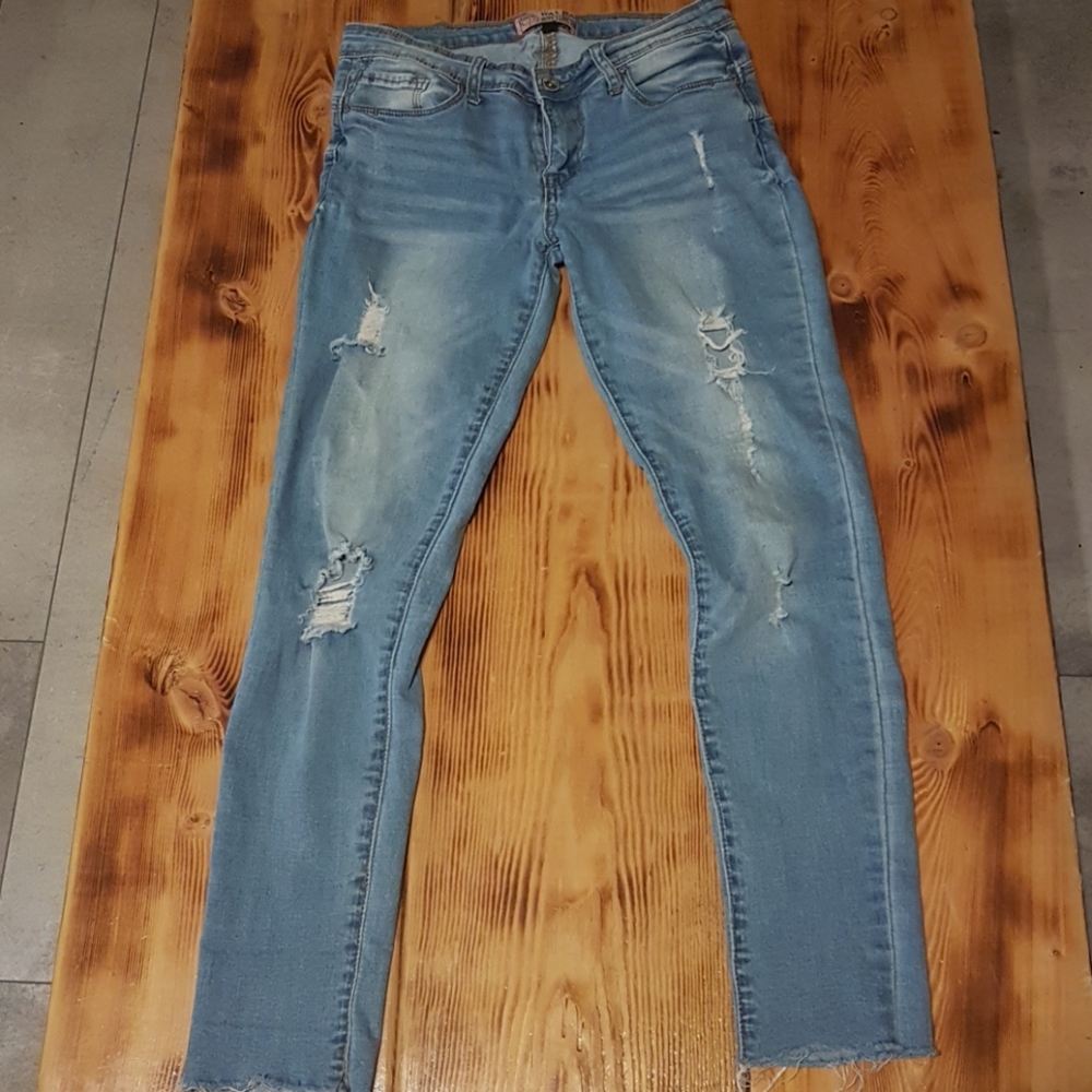 Distressed wax jeans